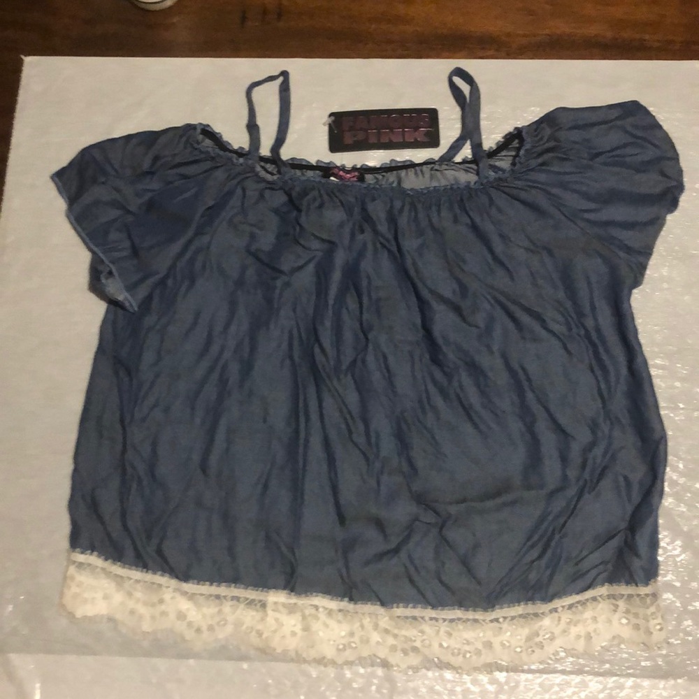 Girls shirt with white lace at the bottom